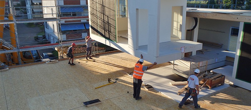 Sound insulation between construction sections with vibration dampening plates