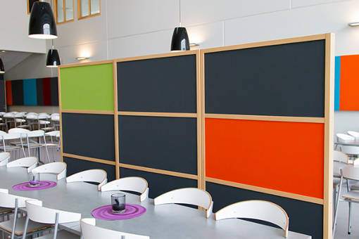 Noise screen in several colours placed in canteen