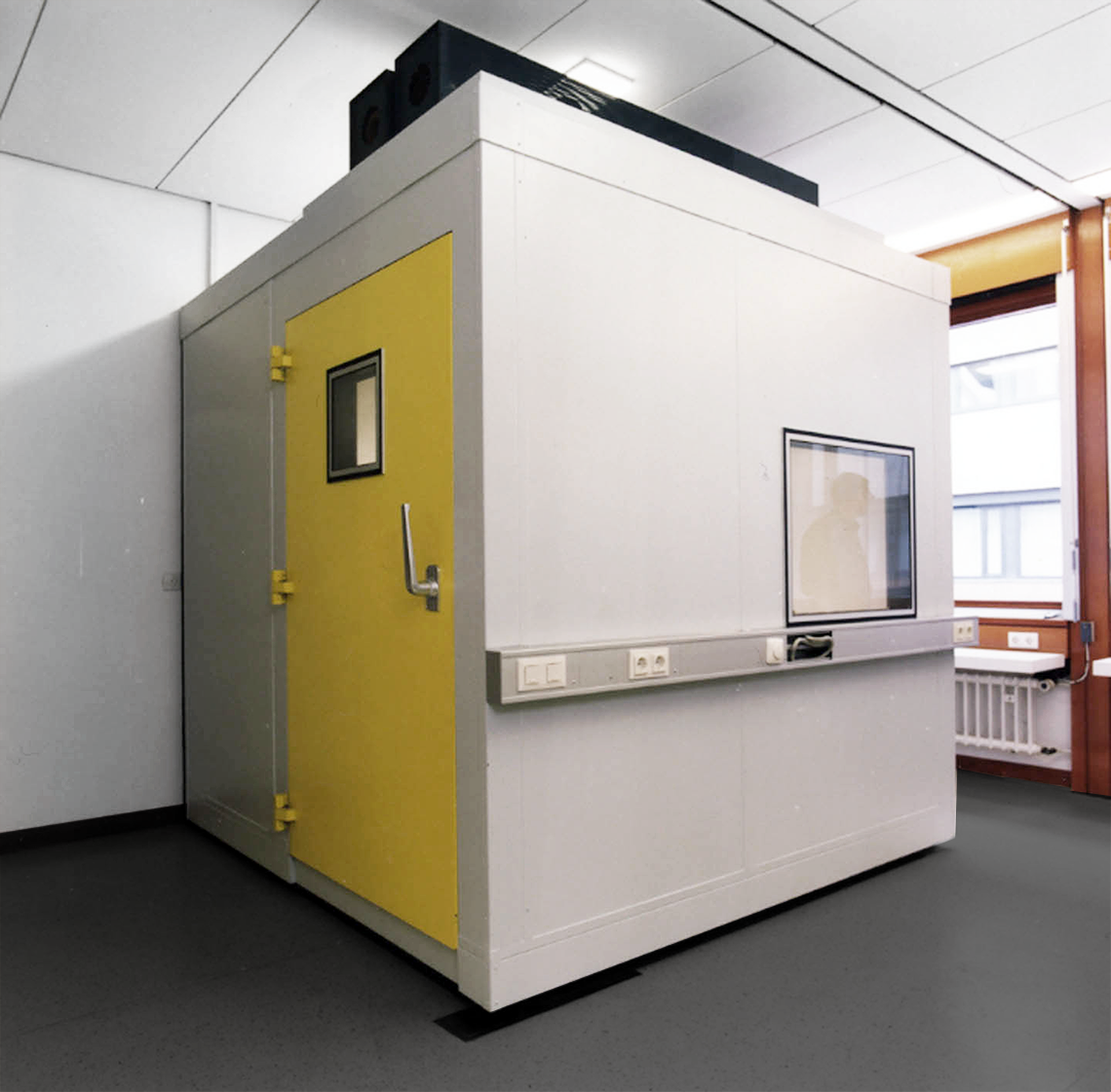 RF shielded room with yellow door and a window