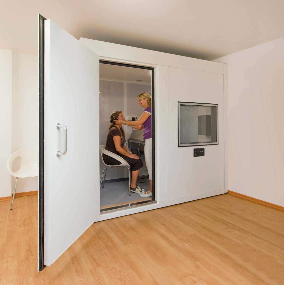 single wall audiometric sound room in white room