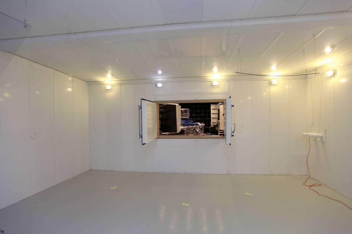 bright room with hard surfaces which reflect sound